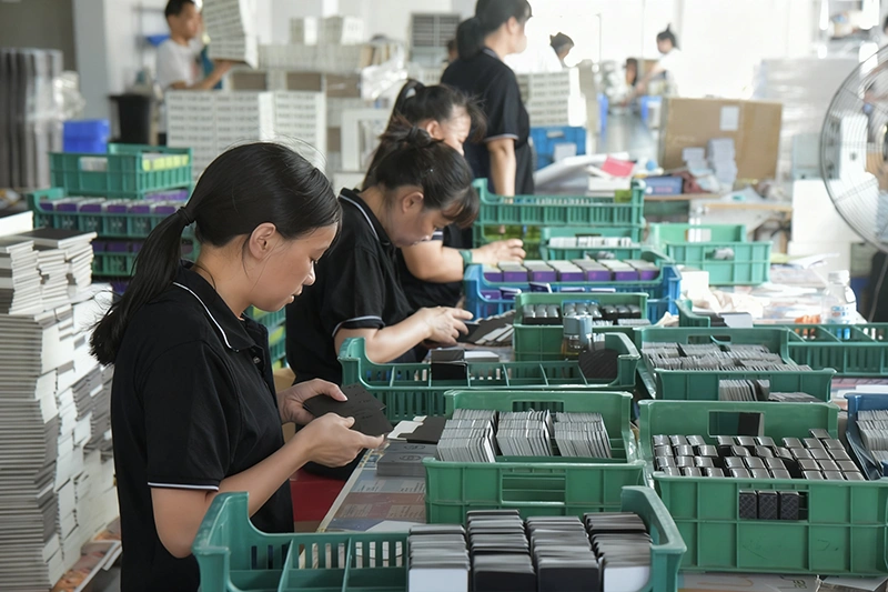Manual inspection and packaging of custom poker and game cards